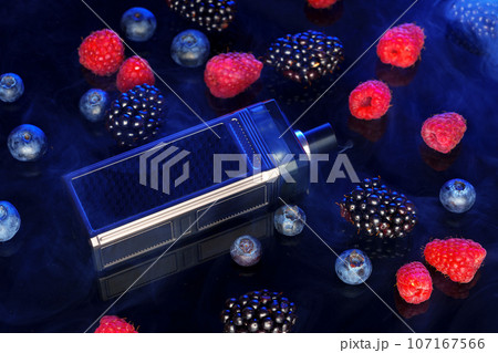 Vape smoking tool on black background with berries Vape smoking tool on black background with berries 107167566