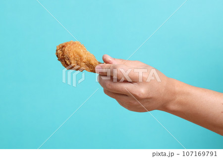 Hand Holding Food Hand Holding Food 107169791