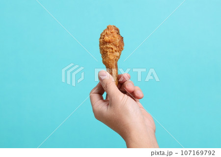 Hand Holding Food Hand Holding Food 107169792