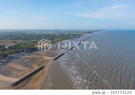Aerial view of clear blue turquoise seawater, Andaman sea in Phuket island in summer season, Thailand. Water in ocean pattern texture wallpaper background. 107173120