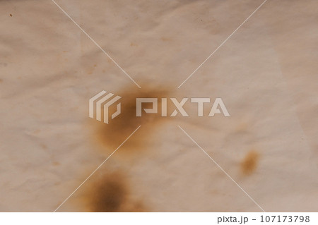 creative background, a spot of  colored primer rubbed on the surface of a linen canvas, temporary object, close, toning 107173798