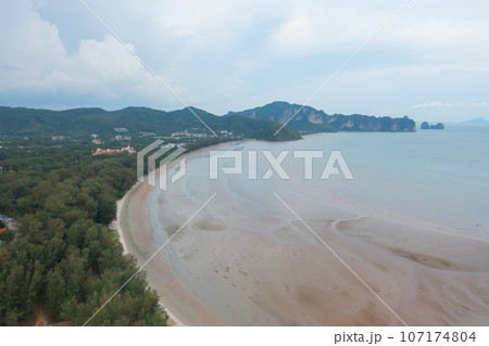 Aerial view of clear blue turquoise seawater, Andaman sea in Phuket island in summer season, Thailand. Water in ocean pattern texture wallpaper background. 107174804