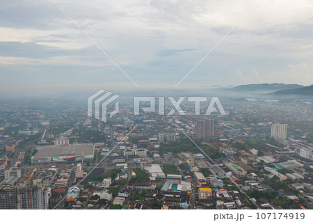Aerial view of residential neighborhood roofs. Urban housing development from above. Top view. Real estate in Phuket, southern province city, Thailand. Property real estate. Aerial view of residential neighborhood roofs. Urban housing development from above. Top view. Real estate in Phuket, southern province city, Thailand. Property real estate. 107174919