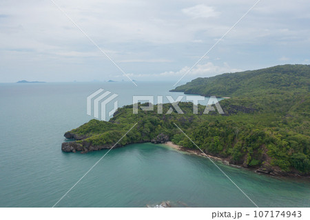 Aerial view of clear blue turquoise seawater, Andaman sea in Phuket island in summer season, Thailand. Water in ocean pattern texture wallpaper background. Aerial view of clear blue turquoise seawater, Andaman sea in Phuket island in summer season, Thailand. Water in ocean pattern texture wallpaper background. 107174943