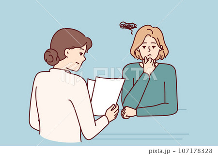 Woman is interviewing in corporation and is nervous waiting for recruiter to read resume Woman is interviewing in corporation and is nervous waiting for recruiter to read resume 107178328