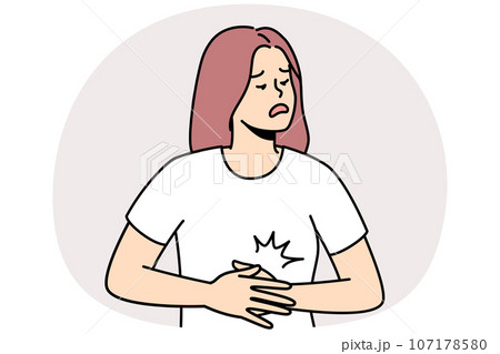 Unwell woman suffer from stomachache Unwell woman suffer from stomachache 107178580