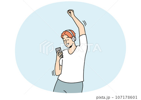 Happy man listen to music in earphones 107178601