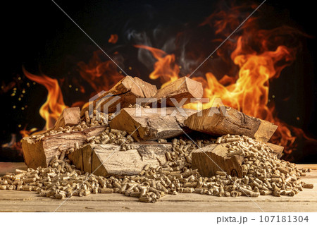 wood pellets and logs with flames wood pellets and logs with flames 107181304