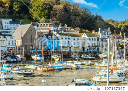 Saint Aubin town seashore view with Sacred heart of Jesus church,, and lots of yachts, bailiwick of Jersey, Channel Islands, Great Britain Saint Aubin town seashore view with Sacred heart of Jesus church,, and lots of yachts, bailiwick of Jersey, Channel Islands, Great Britain 107187367