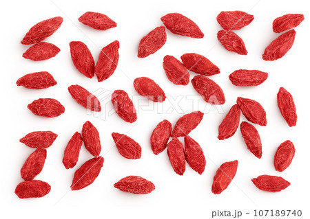 Dried goji berries isolated on white background. Top view. Flat lay. Dried goji berries isolated on white background. Top view. Flat lay. 107189740