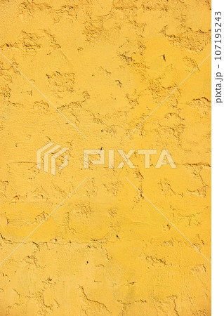 Yellow painted wall Yellow painted wall 107195243