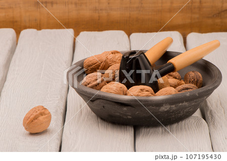 Walnuts in a bowl 107195430