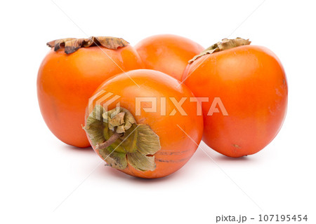 Persimmon fruits on white Persimmon fruits on white 107195454
