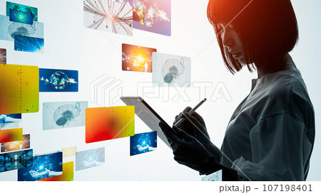 タブレットを使う女性とCG画面 107198401
