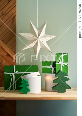 Christmas interior with different gifts. 107198736
