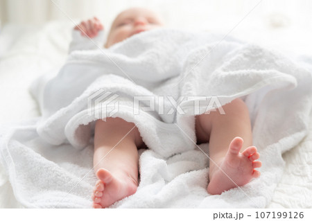 Pure comfort for baby's soft skin. Concept of the blissful aftermath of a bath 107199126