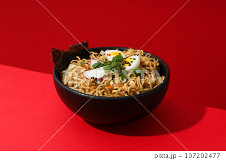 Concept of tasty fast food - instant noodles Concept of tasty fast food - instant noodles 107202477