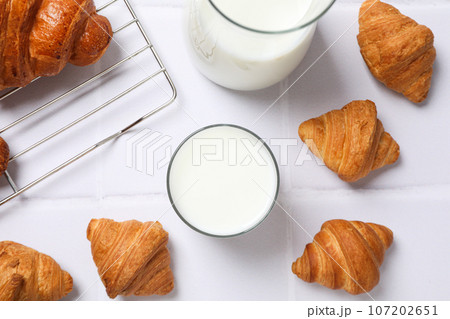 Breakfast tasty food concept - milk with bakery products Breakfast tasty food concept - milk with bakery products 107202651