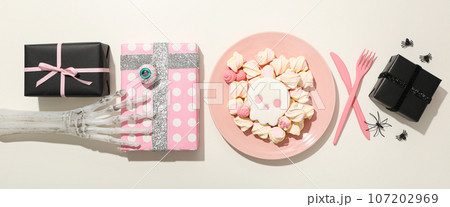 Skull cookies with marshmallows and Halloween gifts Skull cookies with marshmallows and Halloween gifts 107202969