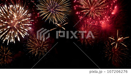 Colorful vibrant Firework celebrate anniversary happy new year 2024, 4th of july holiday festival. colorful firework in night time to celebrate national holiday. countdown new year party background 107206276
