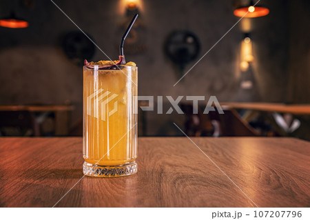 Tropical cocktail with passion fruit Tropical cocktail with passion fruit 107207796