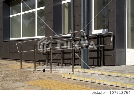 Ramp for wheelchairs on a newly renovated building 107212764
