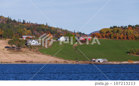Norwegian landscape with colorful countryside wooden houses 107213213