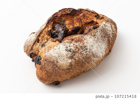 Pain de campagne with figs on white background Pain de campagne with figs on white background 107215418
