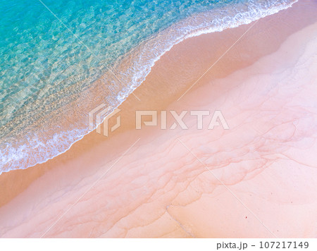 Waves crashing on sandy shore,Sea ocean waves background Waves crashing on sandy shore,Sea ocean waves background 107217149