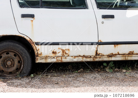 Corrosion, rust on the car body. Corrosion, rust on the car body. 107218696