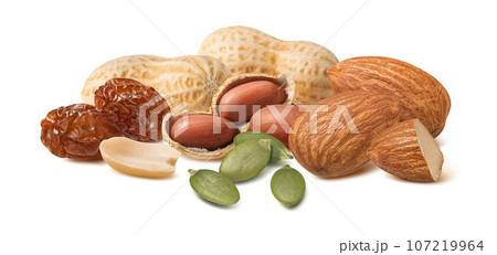 Peanuts, raisins, almonds and pumpkin seeds isolated on white background. Peanuts, raisins, almonds and pumpkin seeds isolated on white background. 107219964