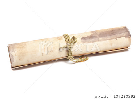 scroll of antique paper tied with a golden rope scroll of antique paper tied with a golden rope 107220592