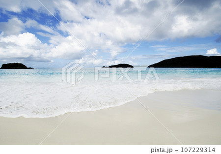 Sea wave on sandy beach at Cinnamon Bay,  Virgin Islands National Park 107229314
