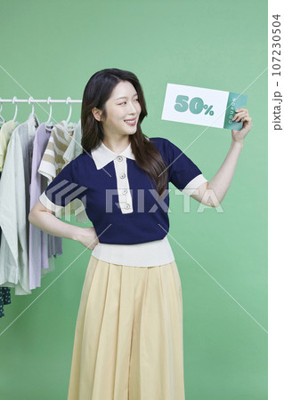 beauty concept photo of korean asain beautiful woman with discount coupon beauty concept photo of korean asain beautiful woman with discount coupon 107230504