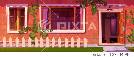 House facade with red brick wall, open door 107234990