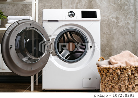 Washing machine in a gray modern laundry room Washing machine in a gray modern laundry room 107238293