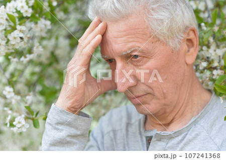 Close up portrait of unhappy senior woman 107241368