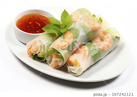 vietnamese spring rolls with sauce isolated on white background vietnamese spring rolls with sauce isolated on white background 107242121