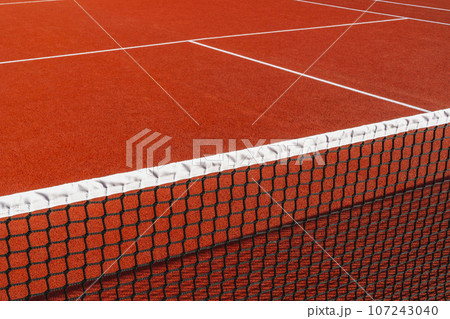 Close-up of tennis net on the court background 107243040