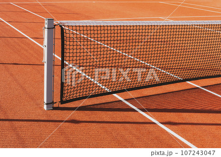 Tennis net on the court background Tennis net on the court background 107243047