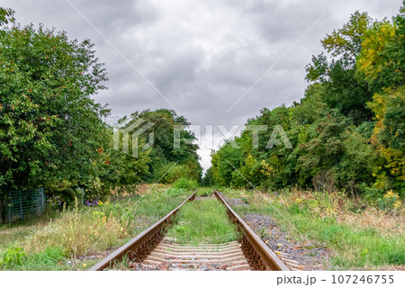 Photography to theme railway track after passing train on railroad 107246755