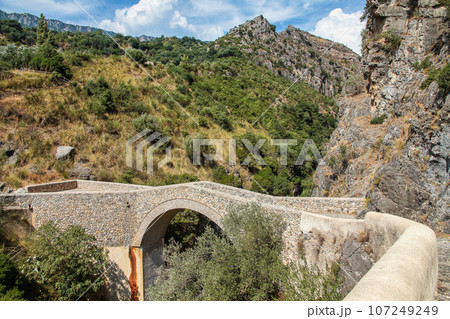 Raganello Gorge with Devil bridge in Civita, Calabria, Italy. Beautiful mountain landscape of the Pollino National Park 107249249