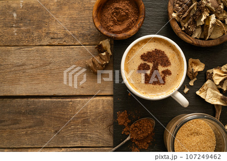 Mushroom coffee concept - mushroom shaped art on coffee cup Mushroom coffee concept - mushroom shaped art on coffee cup 107249462