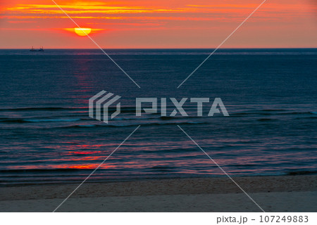 Sunset over sea on Sylt island, Germany Sunset over sea on Sylt island, Germany 107249883