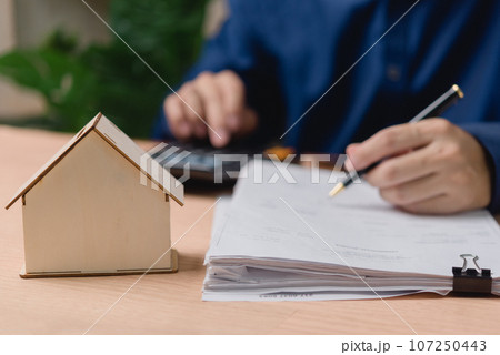 Real estate and investment, buying a house by contract or loan finance and banking. home insurance or property. 107250443