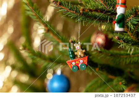 Christmas tree toys on the branches of the Christmas tree. Christmas tree toys on the branches of the Christmas tree. 107253437