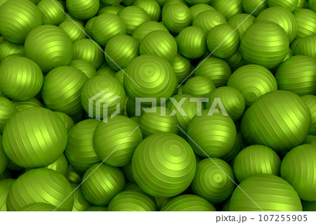 Pile of green fitness ball or fitball falling on white background Pile of green fitness ball or fitball falling on white background 107255905