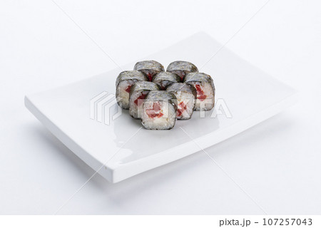 Japanese food restaurant, sushi maki gunkan roll plate or platter set. Sushi set and composition Japanese food restaurant, sushi maki gunkan roll plate or platter set. Sushi set and composition 107257043