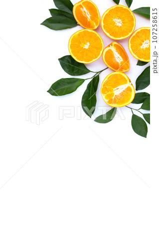 Orange fruit with green leaves on white background. Orange fruit with green leaves on white background. 107258615