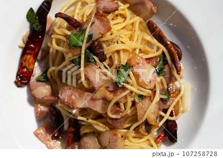 Spaghetti with bacon and chili 107258728
